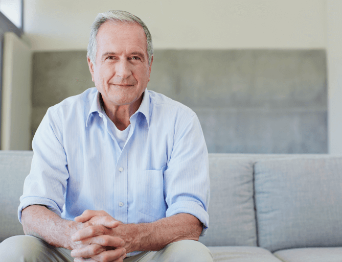 Senior man sitting on a couch