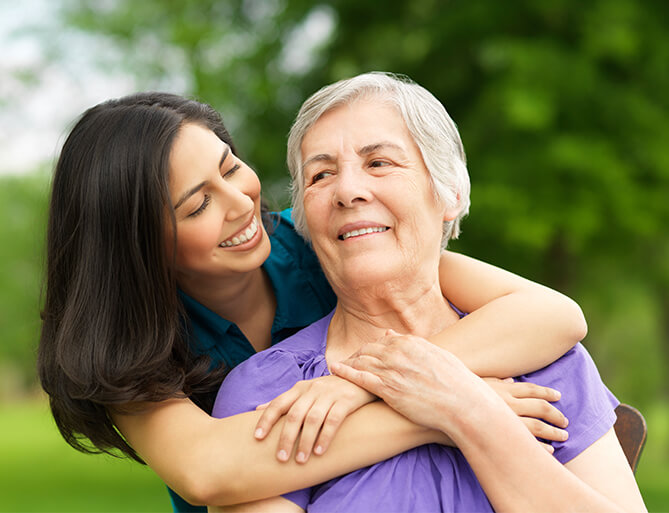 two woman hugging