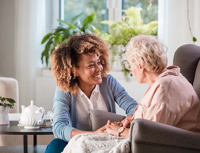 woman talking with nurse